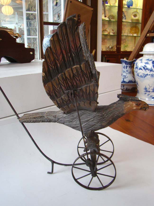A late Victorian carved wooden spread wing eagle push toy — image 3